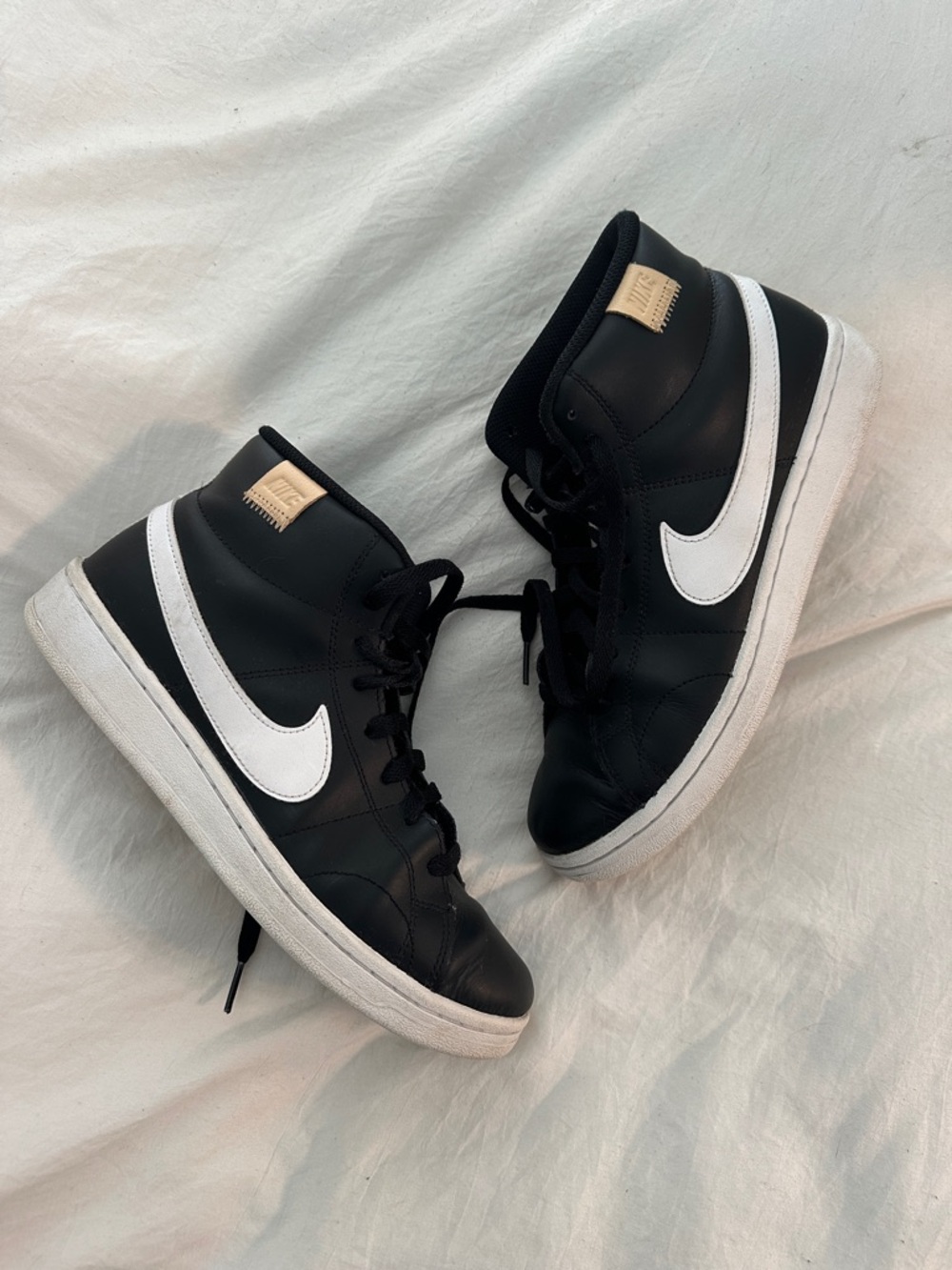 Nike Black and White Mid-Top Sneakers with White Swoosh